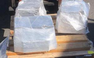 The shipment contained three aluminum blocks, shrink-wrapped and palletized, each weighing approximately 165 pounds.